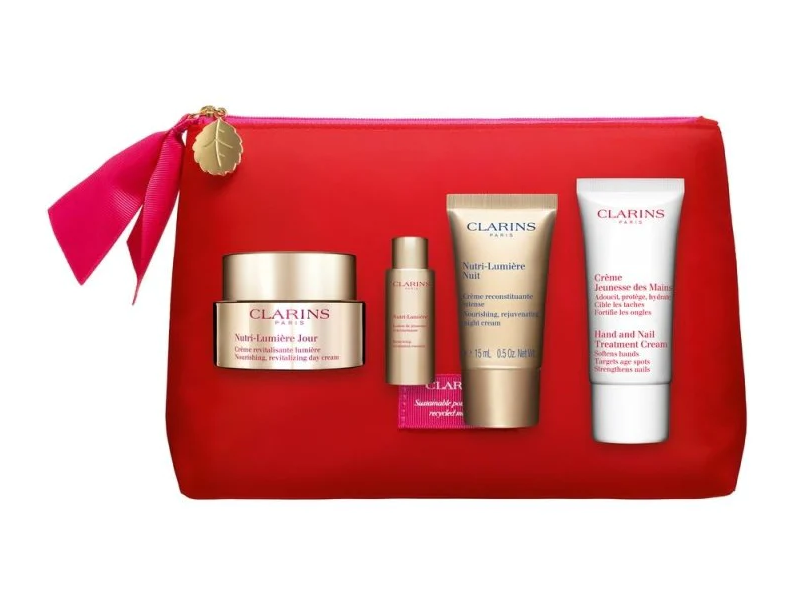 CLARINS GIFT SET 50ML DAY CREAM, 10ML RENEWING TREATMENT,15ML NIGHT CREAM, 30ML HAND CREAM & POUCH